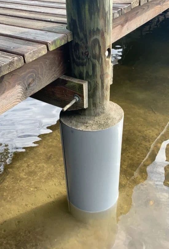Snap Jacket concrete sleeve on a wooden dock piling